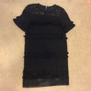 Fun textured black shift dress.